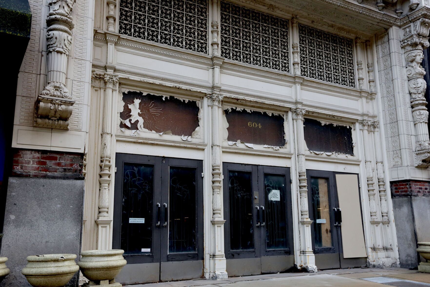 Peeling paint on a Railway Exchange Building former entrance in Dec. 2021